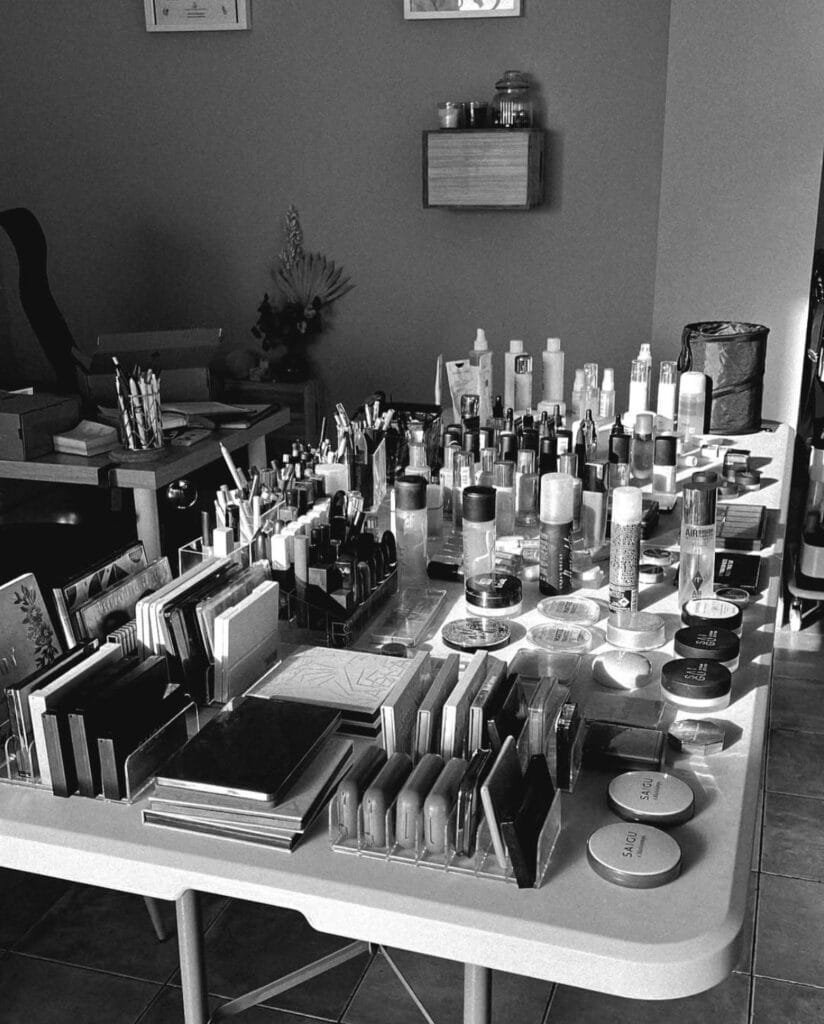 a table with many makeup products