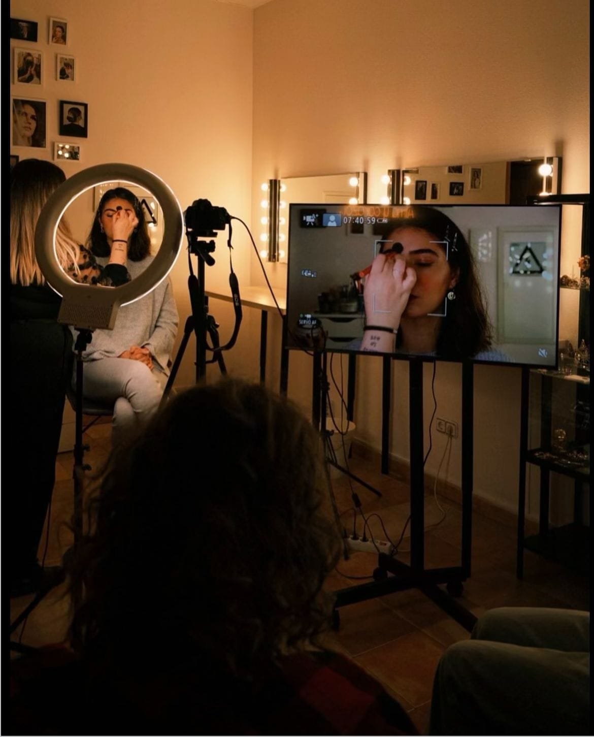 6 a woman sitting in front of a mirror